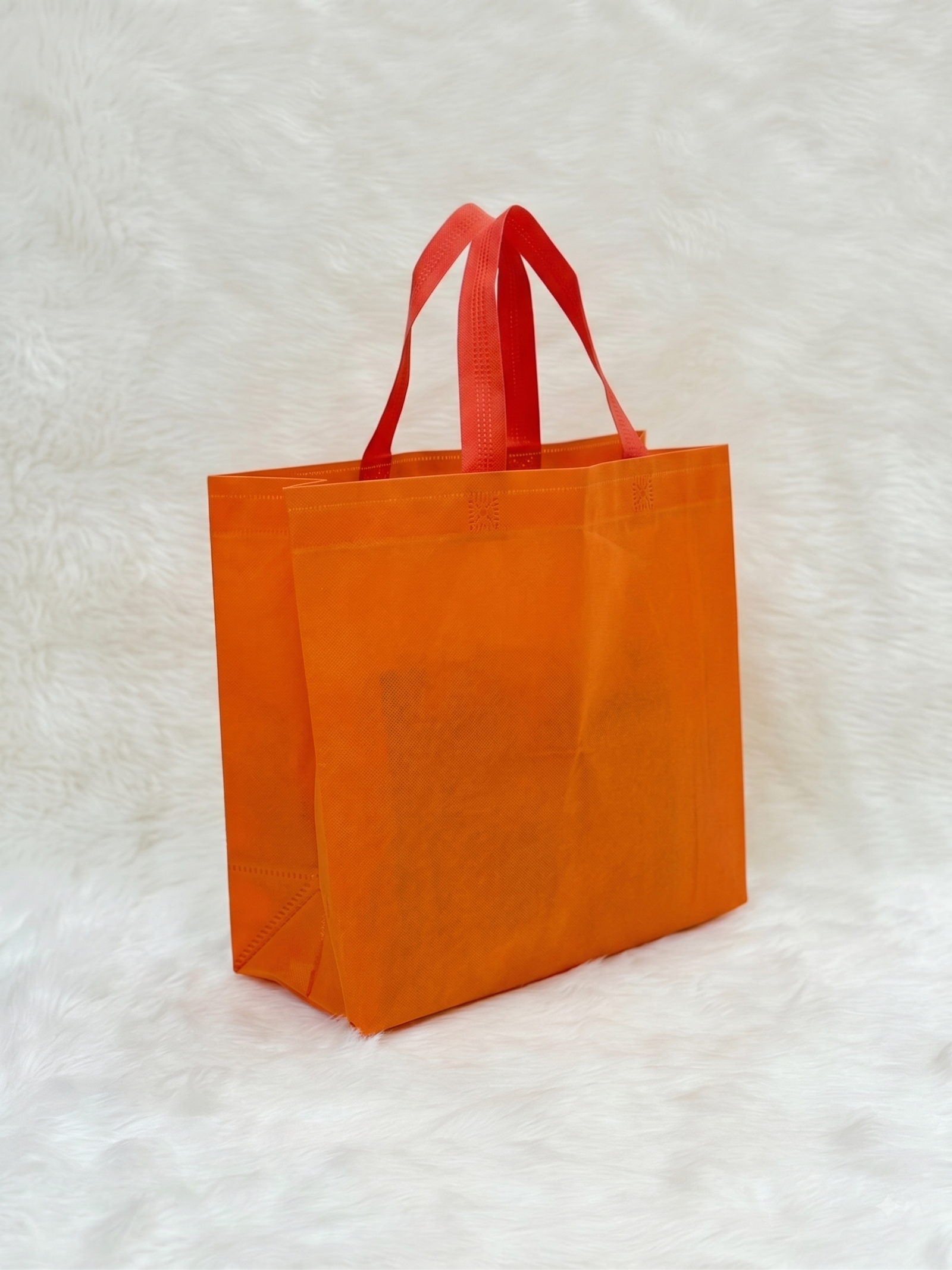 Reusable Non-Woven & Orange Gift Carry Bags – Decorative Shopping & Gift Bags | Pack of 50