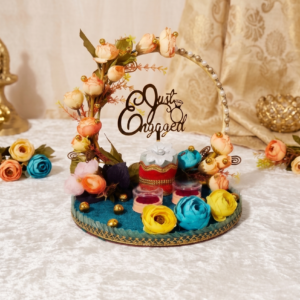 Black Velvet Engagement Ring Platter with dual ring capsules and golden lattice border